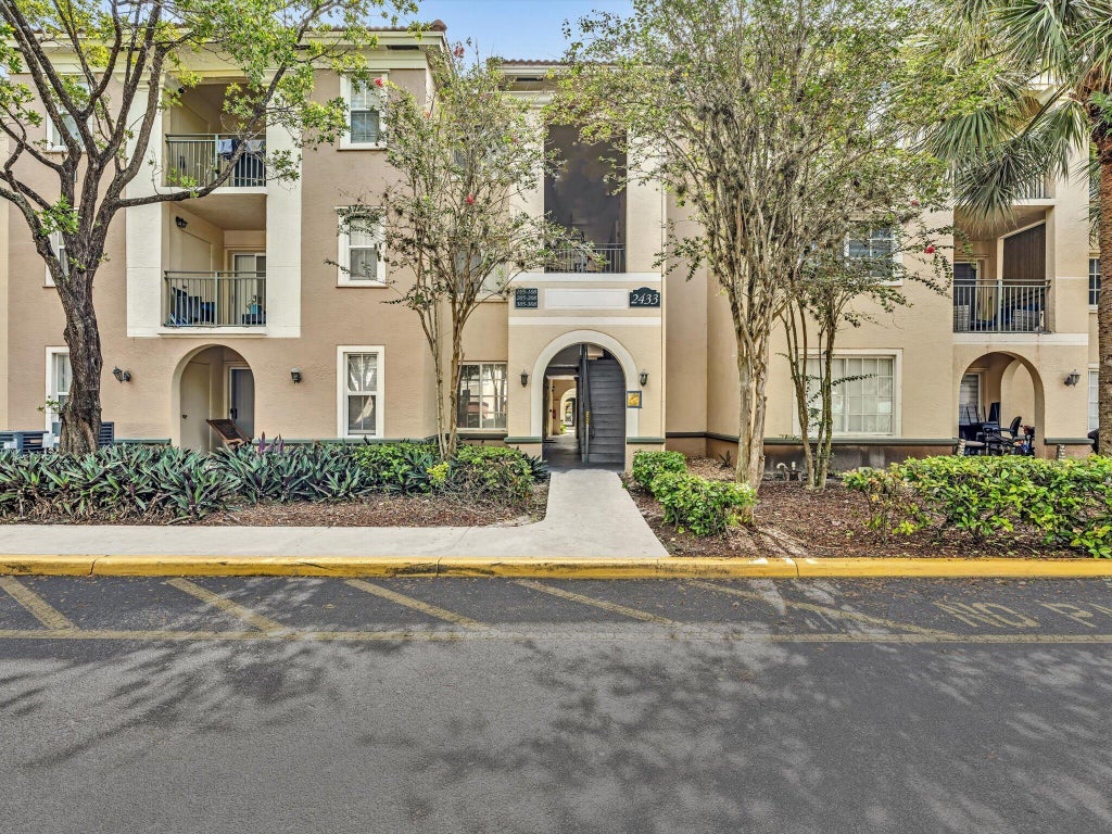 Photo of 2433 Centergate Drive #306, Miramar, FL 33025 (MLS # B26076827)