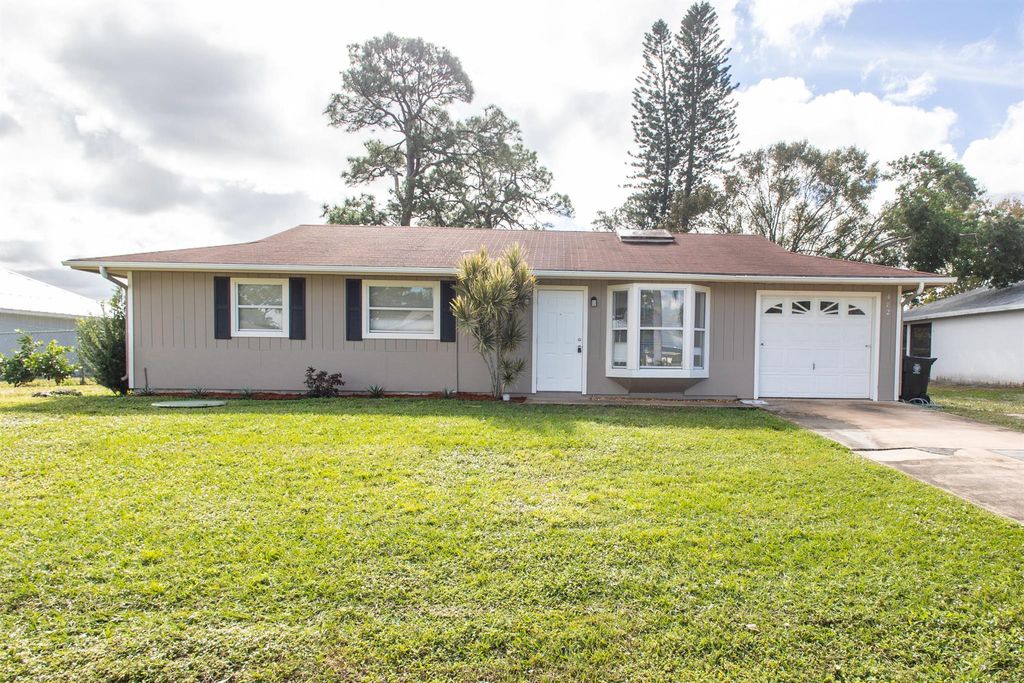 Photo of 482 SE Lancaster Avenue, Port Saint Lucie, FL 34983 (MLS # R11030634)