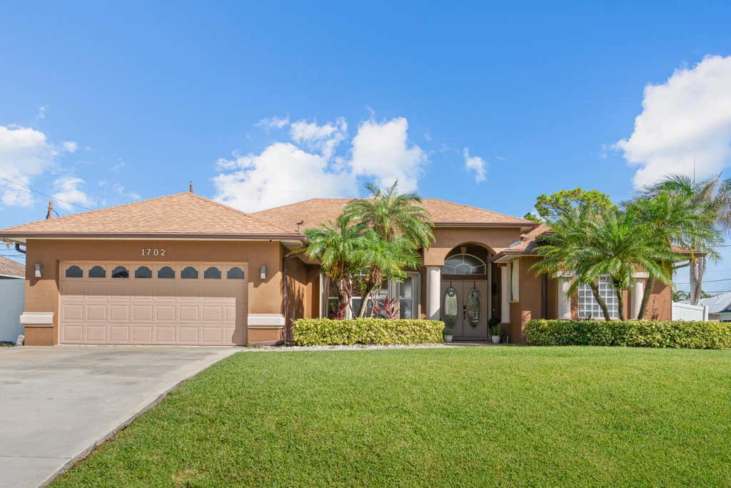Photo of 1702 SW Comfort Street, Port Saint Lucie, FL 34987 (MLS # B26044947)