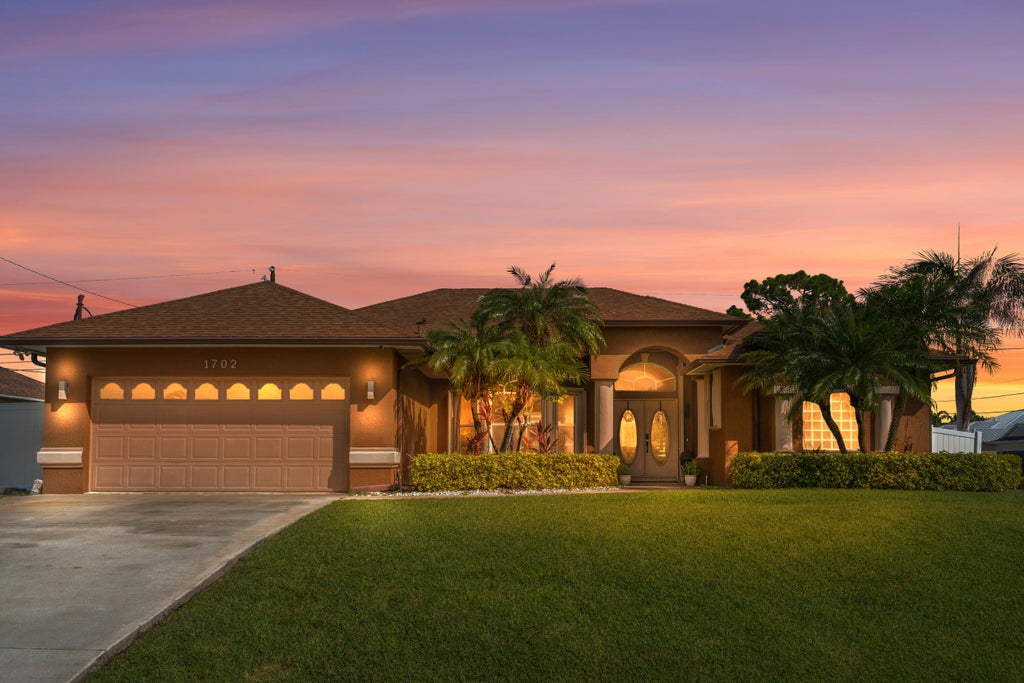 Photo of 1702 SW Comfort Street, Port Saint Lucie, FL 34987 (MLS # B26044947)