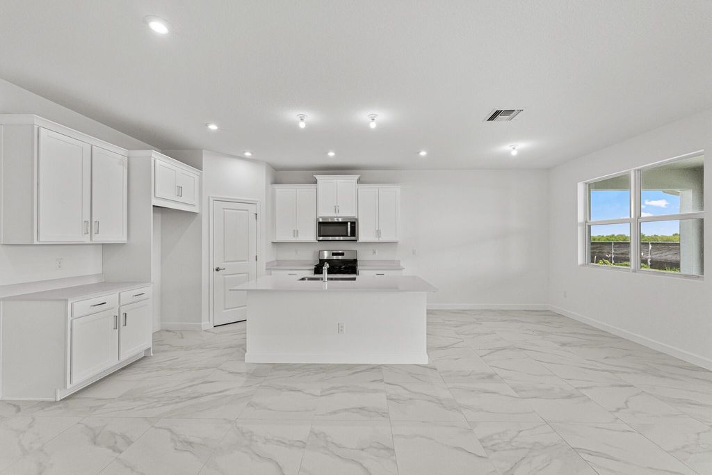 Photo of 14449 SW Ellison Drive, Port Saint Lucie, FL 34987 (MLS # R11131299)