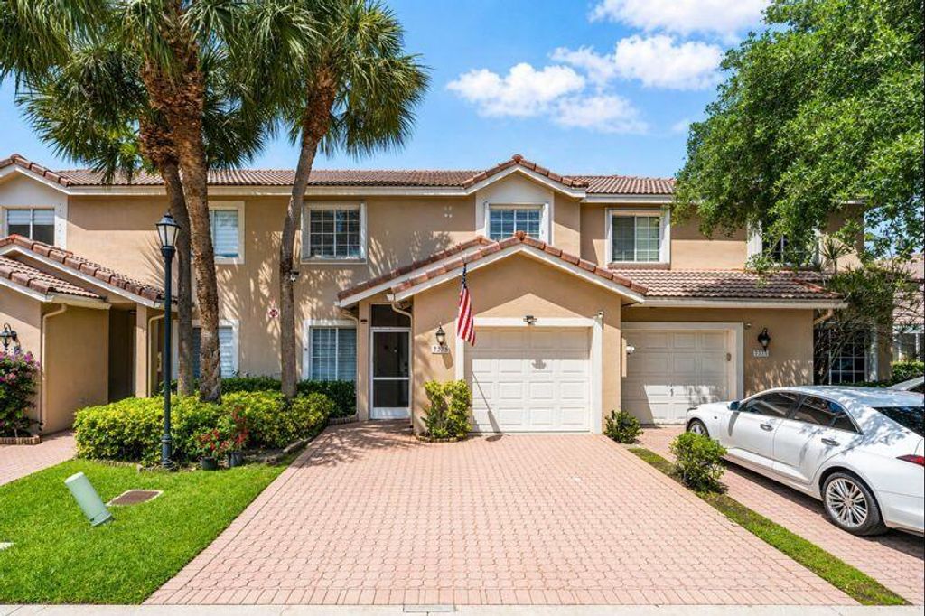 Photo of 7375 NW 61st Terrace #2-19, Parkland, FL 33067 (MLS # B26018621)