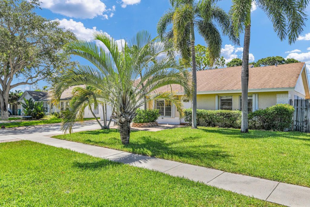 Photo of 1239 NW 13th Avenue, Boynton Beach, FL 33426 (MLS # R11110745)