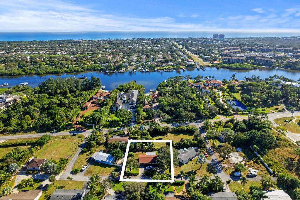 Photo of 15100 Jamaica Drive, Palm Beach Gardens, FL 33410 (MLS # R11041513)