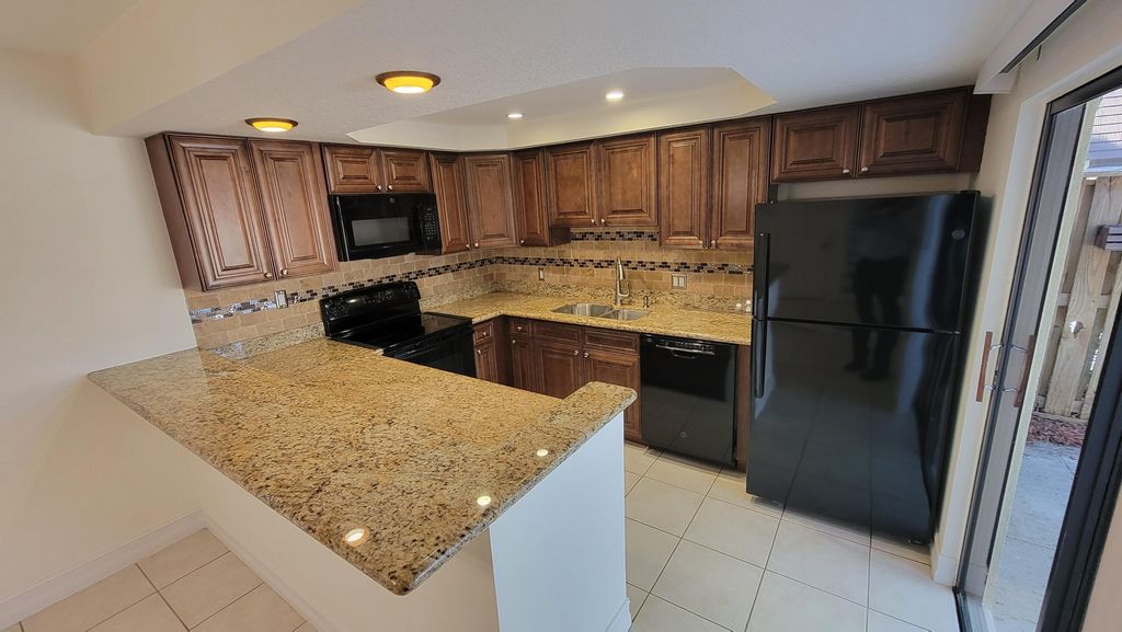 Photo of 117 1st Court, Palm Beach Gardens, FL 33410 (MLS # R11162433)