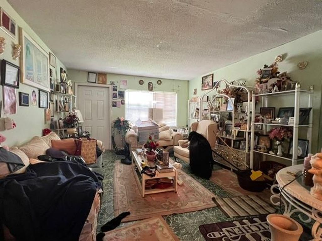 Photo of 491 W Jordan Boulevard, Pahokee, FL 33476 (MLS # F10506167)