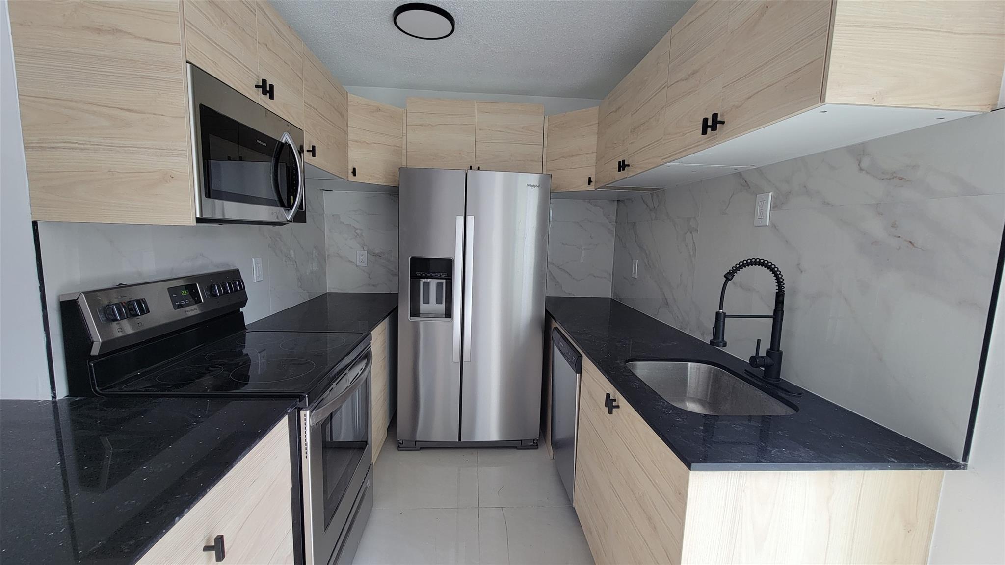 Recently renovated 3-bedroom, 2-bathroom apartment featuring modern finishes, washer and dryer, and spacious living areas. Tenants are responsible for utilities. Move-in requires first month and security deposit ($6,000 total). Available from the 1st October.