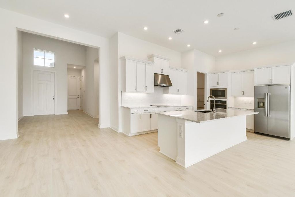 Photo of 9185 SW Esule Way, Port Saint Lucie, FL 34987 (MLS # R11132001)