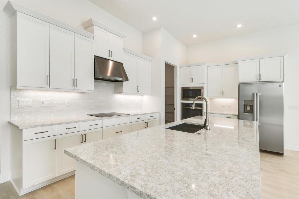 Photo of 9185 SW Esule Way, Port Saint Lucie, FL 34987 (MLS # R11132001)