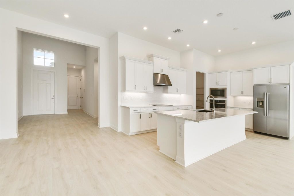 Photo of 9185 SW Esule Way, Port Saint Lucie, FL 34987 (MLS # R11132001)