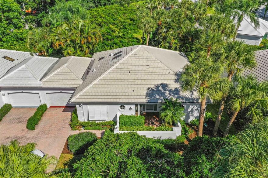 Admirals Cove cottage located steps to clubhouse and marina. Offered with rare Social membership! Home features quiet, serene open landscaped view. Room for private hot tub. Granite counter-tops, custom stone backsplash.  Folding hurricane shutters, wet bar, skylights, 15 foot cathedral ceilings, coral stone floors. This club cottage is being offered at $475,000 FURNISHED.  A wonderful value!