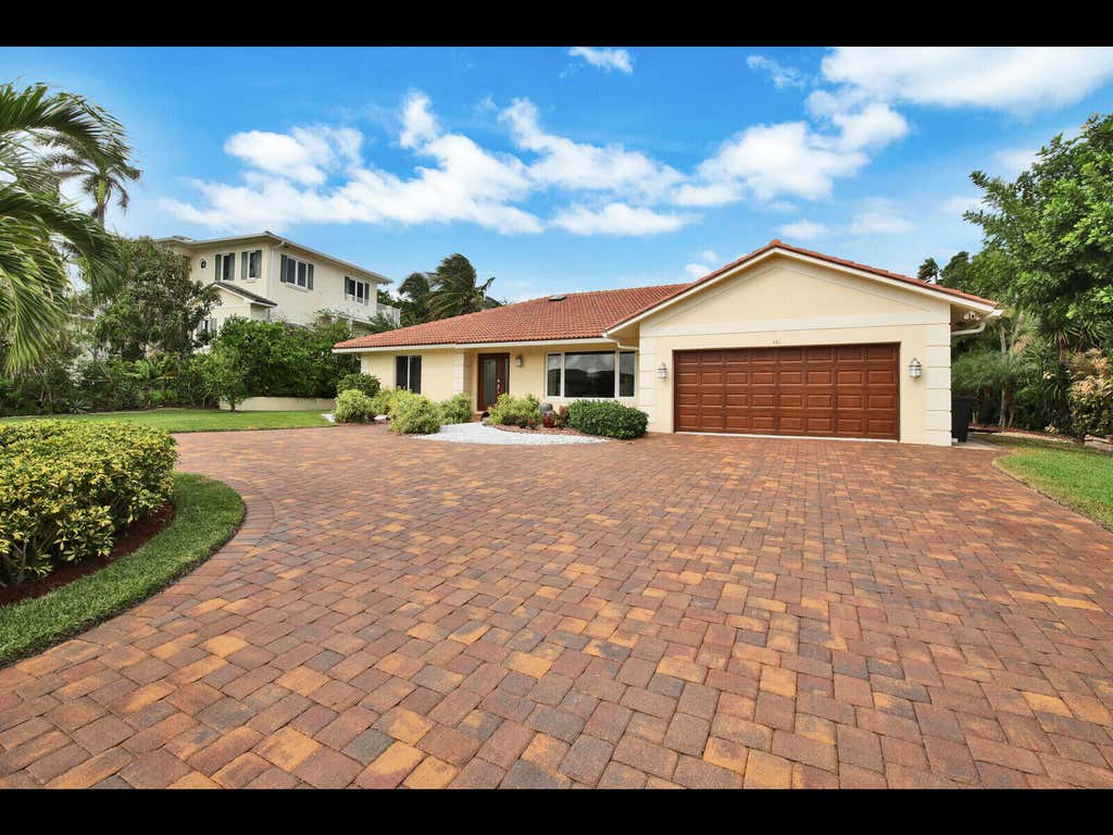Photo of 451 N LYRA Circle, Juno Beach, FL 33408 (MLS # B26054860)