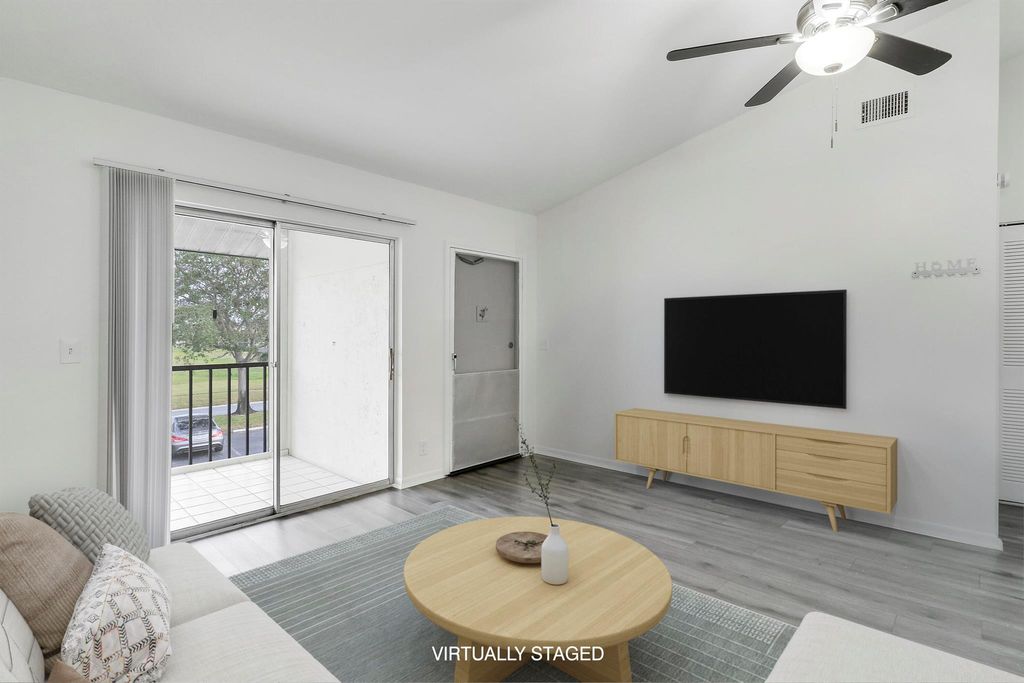 Photo of 6392 Chasewood Drive #F, Jupiter, FL 33458 (MLS # R11143919)