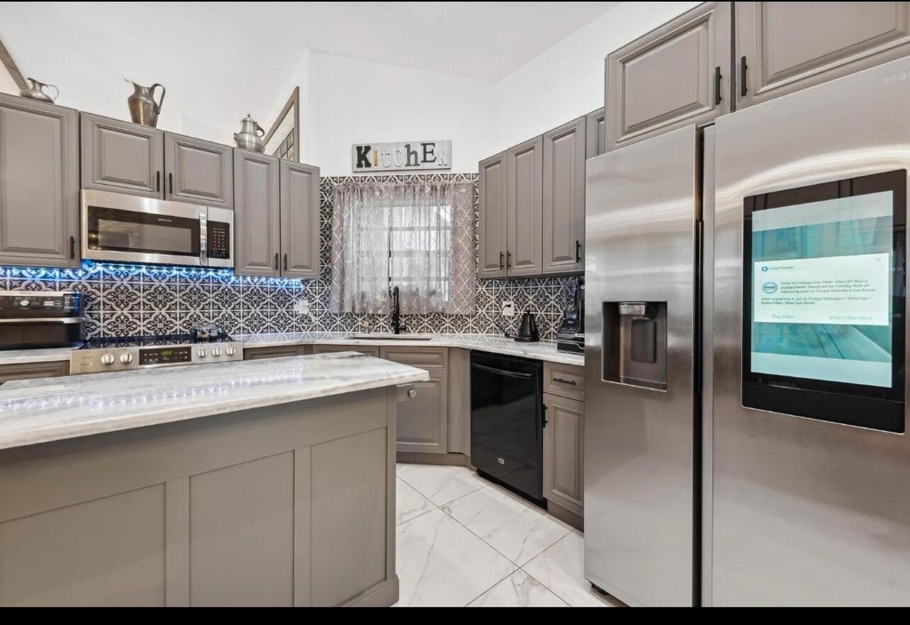 Photo of 4355 NW 52nd Street, Coconut Creek, FL 33073 (MLS # R11094480)