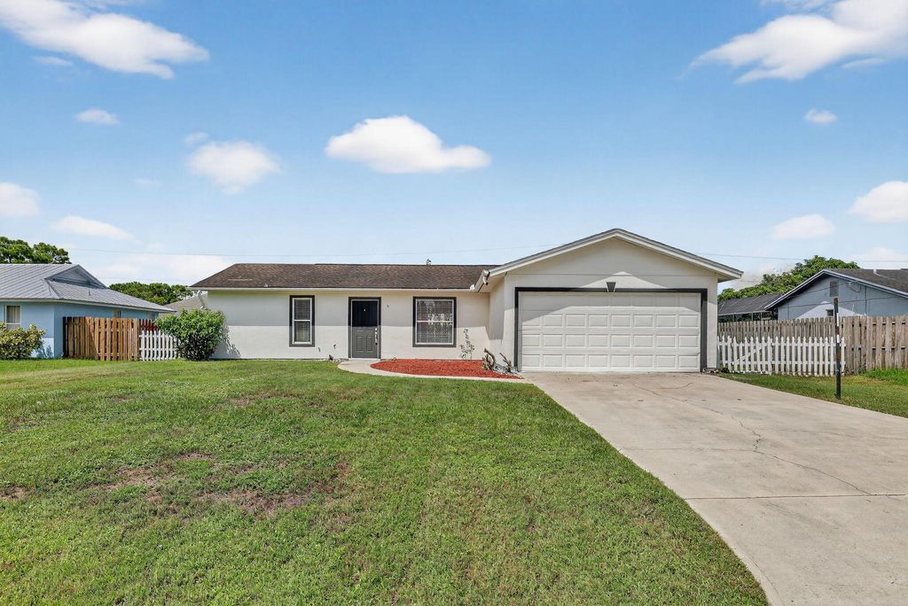 Photo of 561 SE Karrigan Terrace, Port Saint Lucie, FL 34983 (MLS # R11126965)