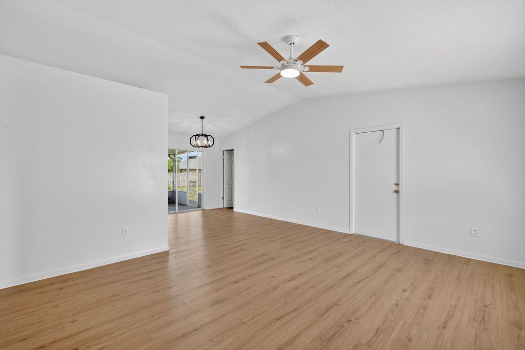 Photo of 561 SE Karrigan Terrace, Port Saint Lucie, FL 34983 (MLS # R11126965)