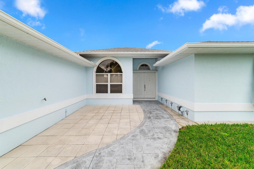 Photo of 2474 SE Marius Street, Port Saint Lucie, FL 34952 (MLS # R10953851)