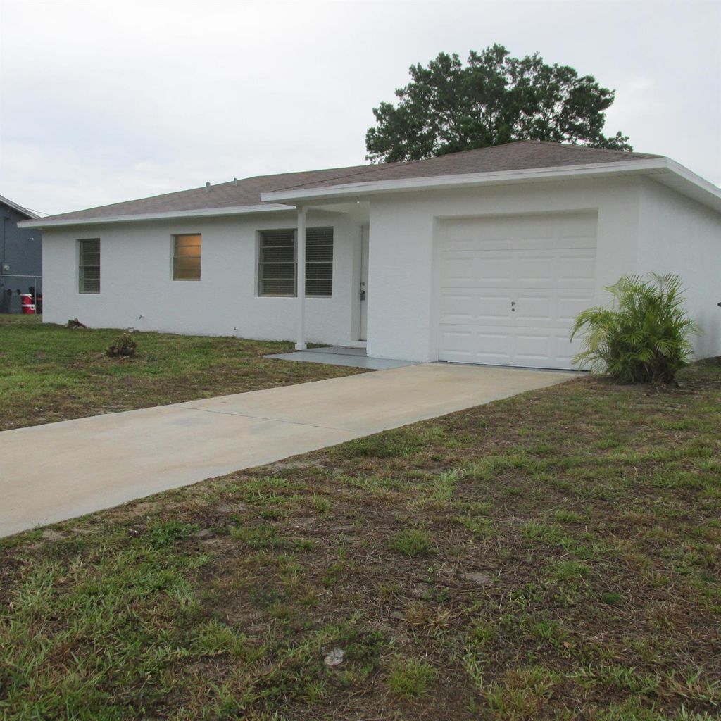 Photo of 607 SW Seagull Terrace, Port Saint Lucie, FL 34953 (MLS # R11094072)