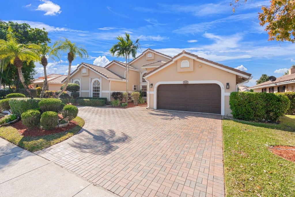 Photo of 9938 N Springs Way, Coral Springs, FL 33076 (MLS # F10551073)