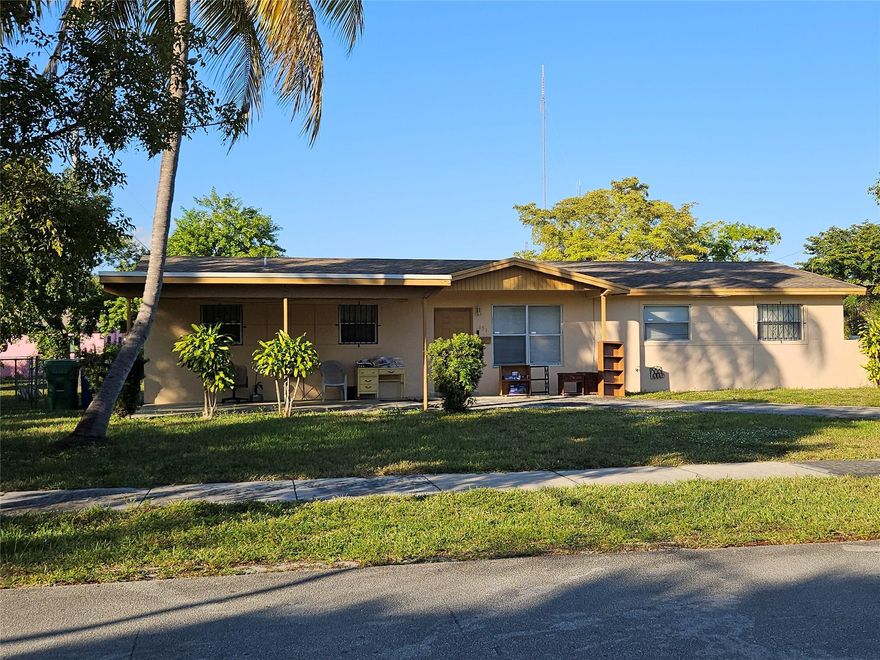 Corner 3 br 2 ba with a carport.  Fenced yard. Plenty of parking space.  Close to Aventura.  Borderline of Miami Dade and Broward County.