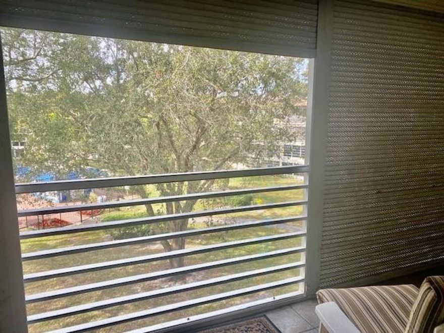 JUST REDUCED .....Clean 2/2 in top floor facing the pool.  Unit offers Laminate and tile flooring throughout out.  Water Heater was replaced in 2010 and the A/C was replaced in 2007.  Unit is clean and is priced for a quick sale . Parking Space number is 124