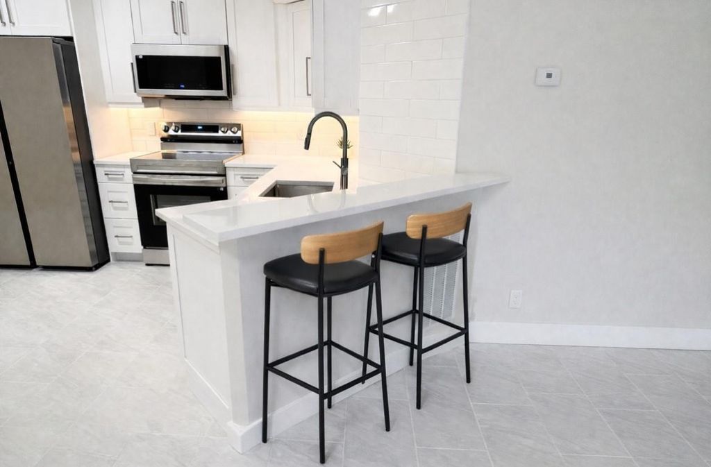 Photo of 9055 Wiles Road #208, Coral Springs, FL 33067 (MLS # F10539661)