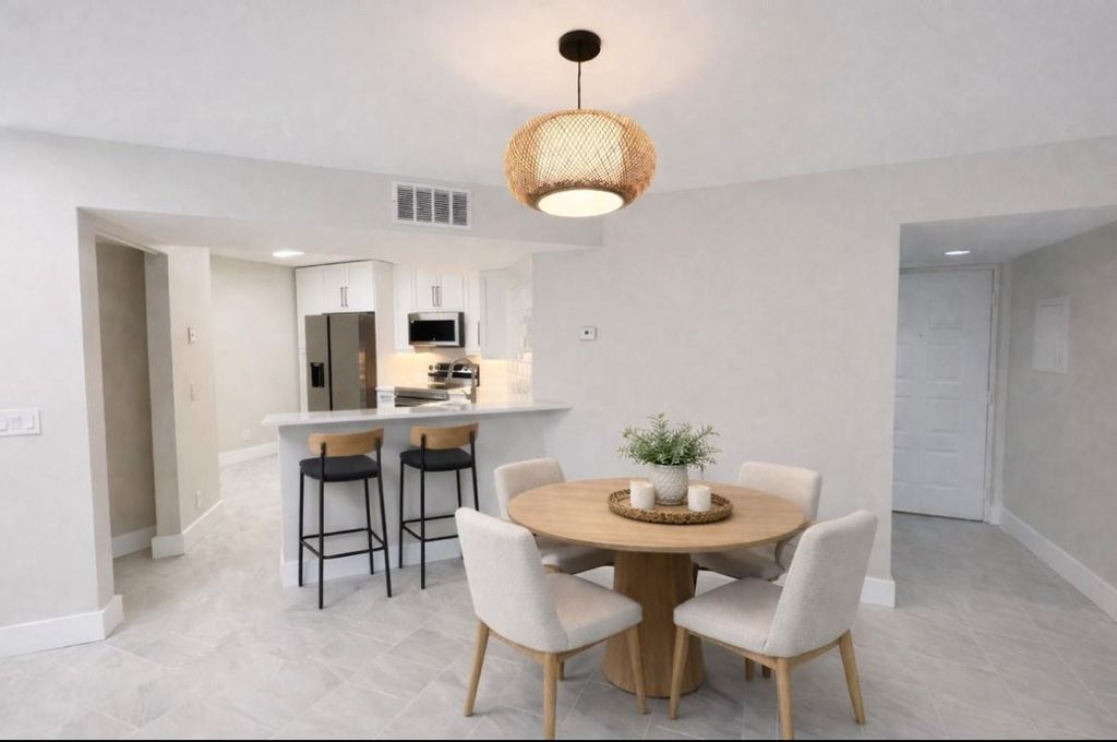 Photo of 9055 Wiles Road #208, Coral Springs, FL 33067 (MLS # F10539661)