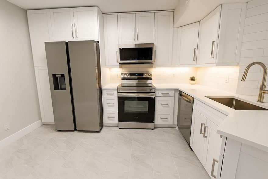 *** Brand new Everything***  Be the first to live in this completely renovated condo!!!  Peaceful views of the mature trees and lake from every room!! Brand new kitchen and bathrooms!!  Kitchen features brand new stainless steel appliances + Phillips Hue under cabinet lighting (change to any color you like)!!  Beautiful tile flooring throughout with warm LVT wood flooring in the master bedroom.  Modern master bathroom complete with matte black finishes + an espresso vanity. Full size washer and dryer in unit!! Management on site - 2 swimming pools, gym, tennis court, club house with spa/hot tub, playground. All ages welcome. Pet Friendly.