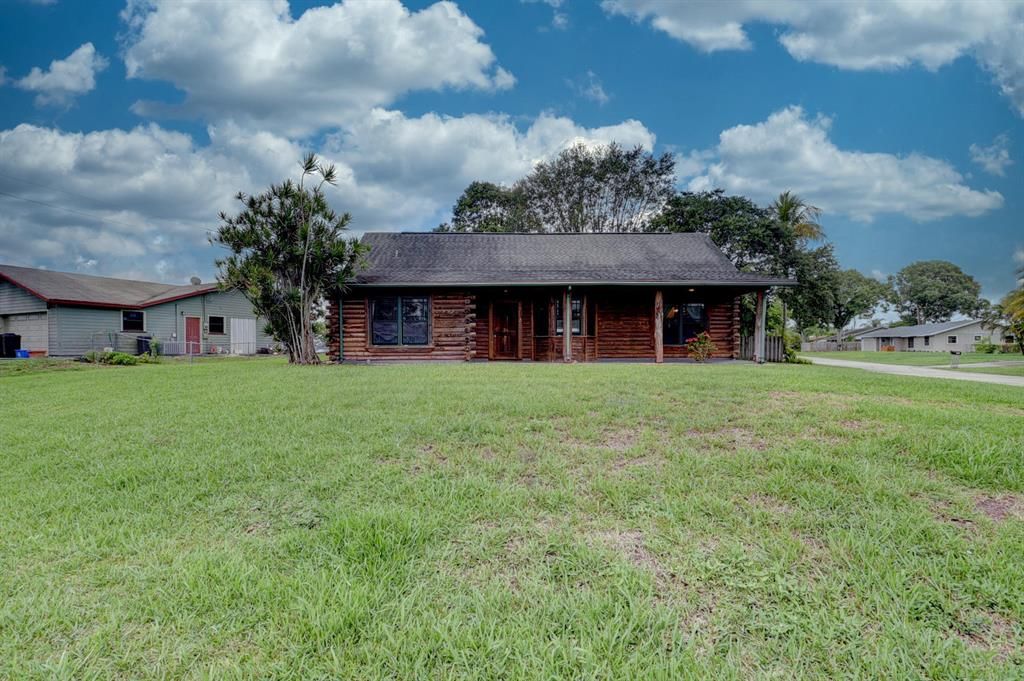 Photo of 4963 Bonanza Road Rd, Lake Worth Beach, FL 33467 (MLS # R10726124)