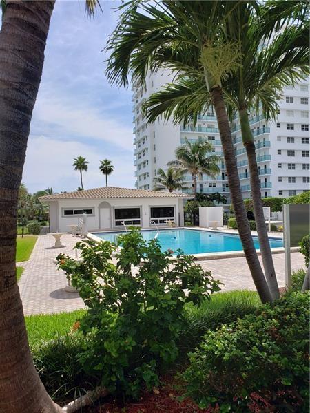 Tastefully furnished ANNUAL rental in Tiffany Gardens on the ocean side. Ocean view from the balcony & primary bedroom, Intracoastal views from the living areas and kitchen. Fresh paint, new sofa, new refrigerator ready for a new tenant. Community pool, boccee ball, shuffle board, gated beach access & outdoor shower. Very nice grounds to enjoy.