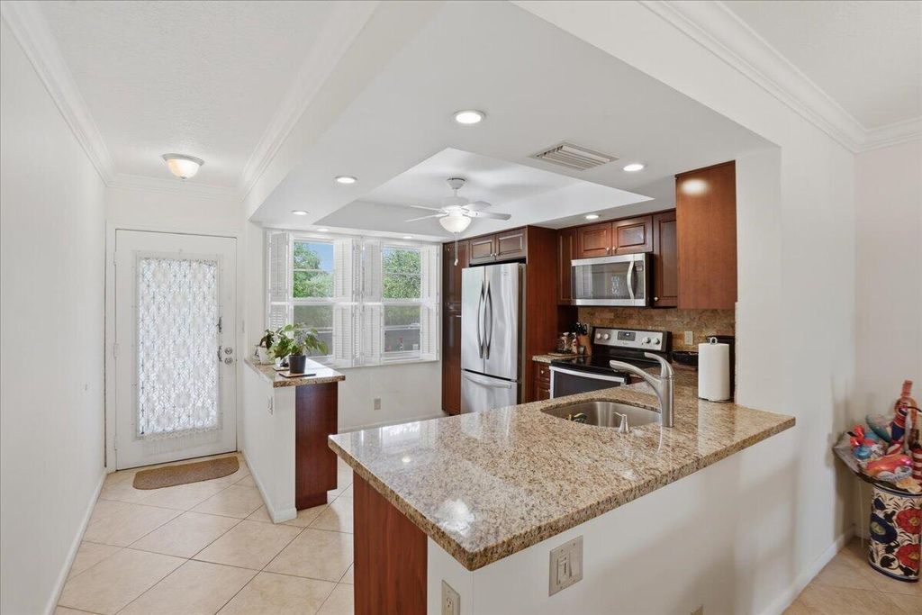 Photo of 3004 Portofino Isle #E2, Coconut Creek, FL 33066 (MLS # B26020496)