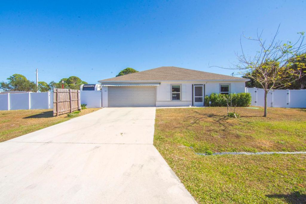 Photo of 159 SW Milburn Circle, Port Saint Lucie, FL 34953 (MLS # R11152955)