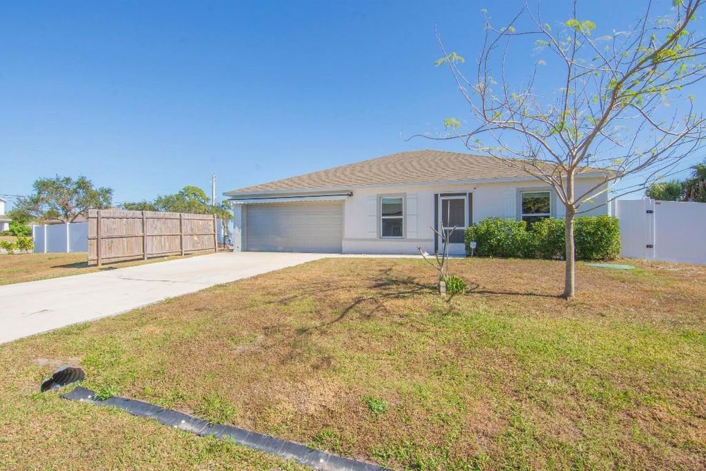 Photo of 159 SW Milburn Circle, Port Saint Lucie, FL 34953 (MLS # R11152955)