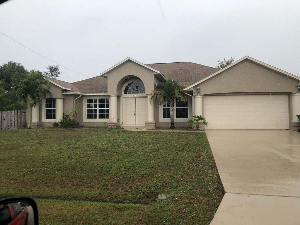 Photo of 521 SW Lawler Avenue, Port Saint Lucie, FL 34953 (MLS # R11010563)