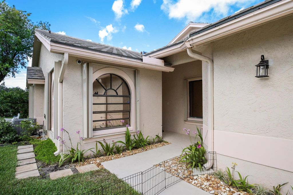 Photo of 10828 Stafford Circle N, Boynton Beach, FL 33436 (MLS # R11063893)