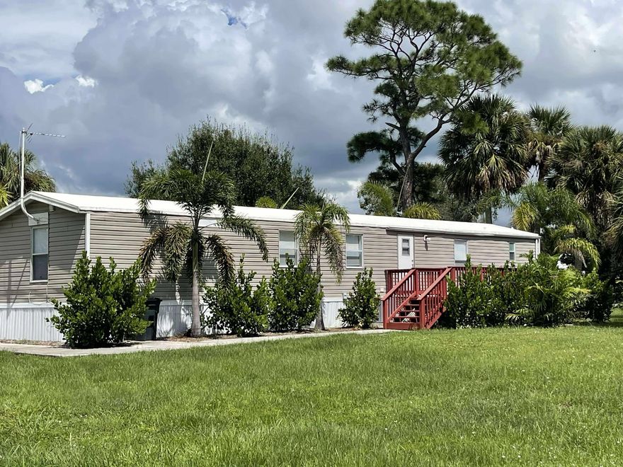 This gorgeous 2 bedroom, 2 bath split-floor plan manufactured home on half an acre has been totally renovated and is move-in ready. If you've been waiting for the perfect mix of country charm +modern updates! Spacious open layout with a split bedroom design for privacy.Massive master suite with spa-like en suite bathroom. Newly updated kitchen + stylish new flooring = modern farmhouse vibes. Huge 12x24 detached shed/metal building for storage, workshop, or toys.Brand new well pump! A Water treatment system. Brand new 3-ton A/C. Ample cement driveway parking for RV / Boat.Roof coated just 2 years ago. Backyard backs up to a peaceful cow pasture. Wake up to wide open views and fresh country air. Whether you're looking for your forever home, or a seasonal retreat.