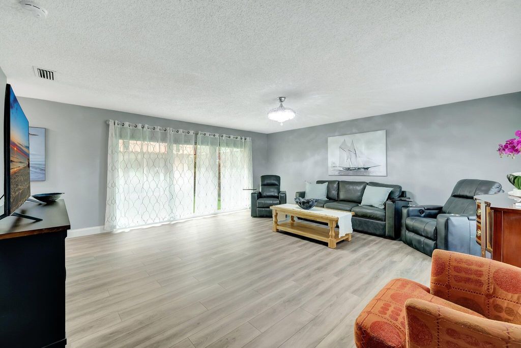 Photo of 4002 SE Fairway W, Stuart, FL 34997 (MLS # R11118989)