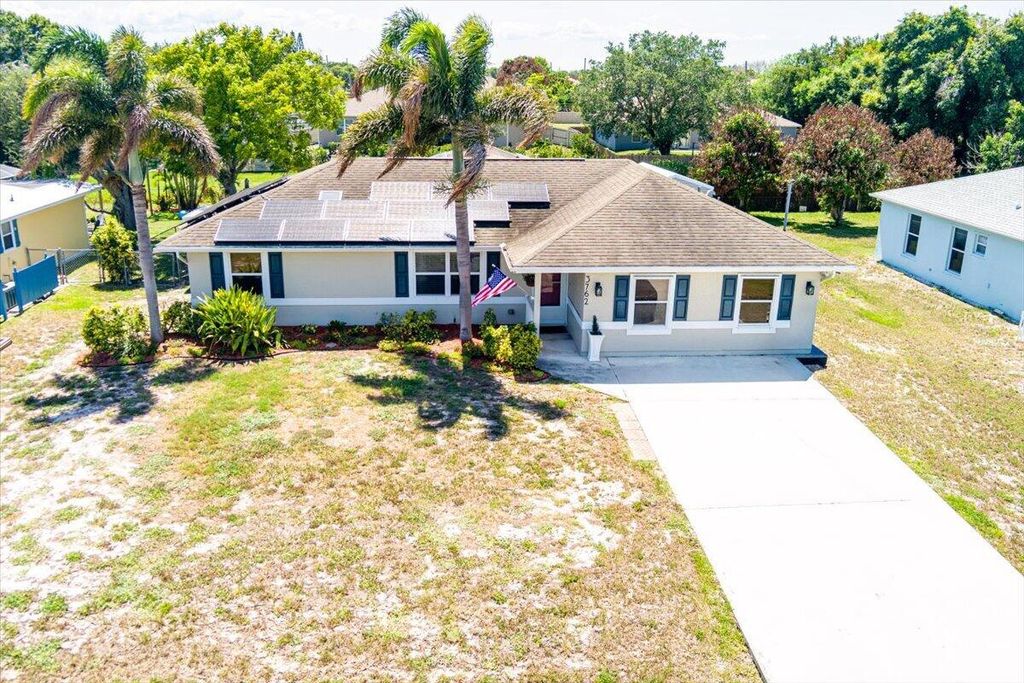 Photo of 3762 SW Lachine Street, Port Saint Lucie, FL 34953 (MLS # B26039006)