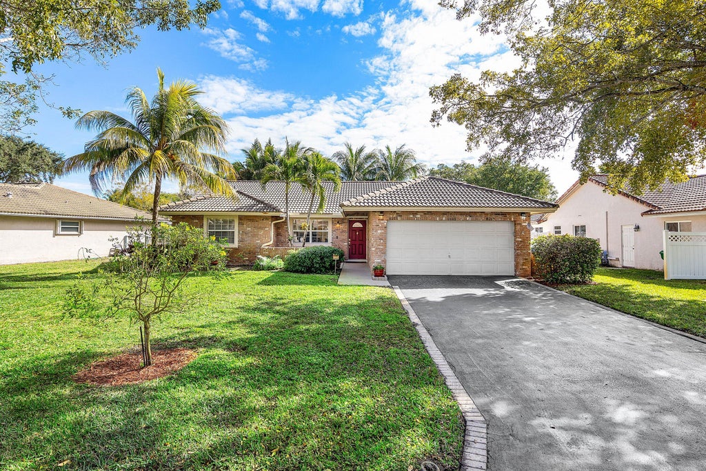 Photo of 1491 NW 112th Terrace, Coral Springs, FL 33071 (MLS # R11161845)