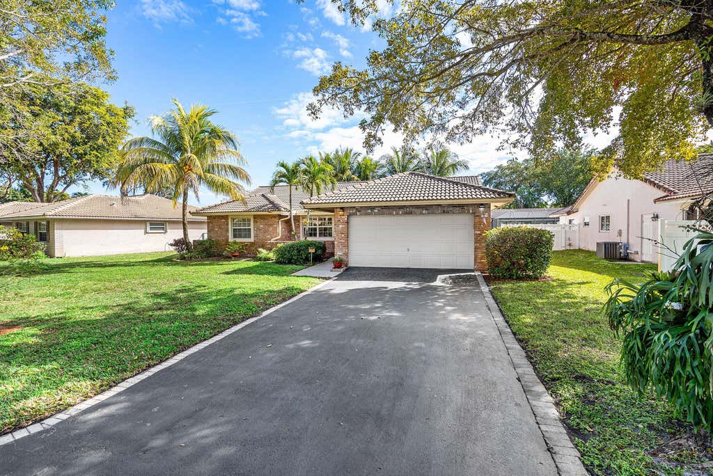 Photo of 1491 NW 112th Terrace, Coral Springs, FL 33071 (MLS # R11161845)
