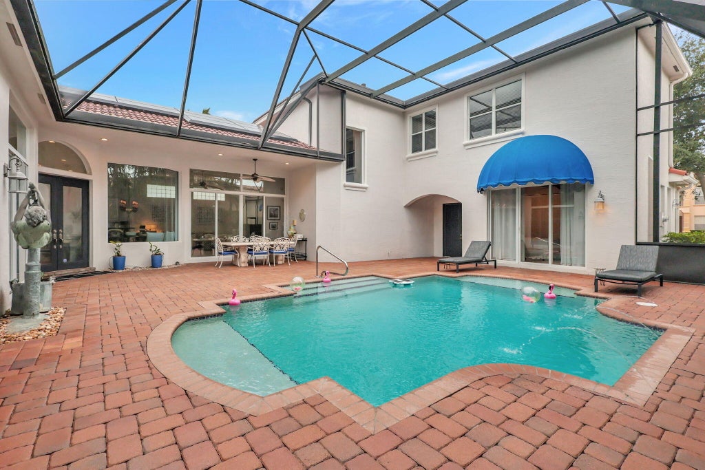 Photo of 102 Villa Nueva Place, Palm Beach Gardens, FL 33418 (MLS # R11066938)