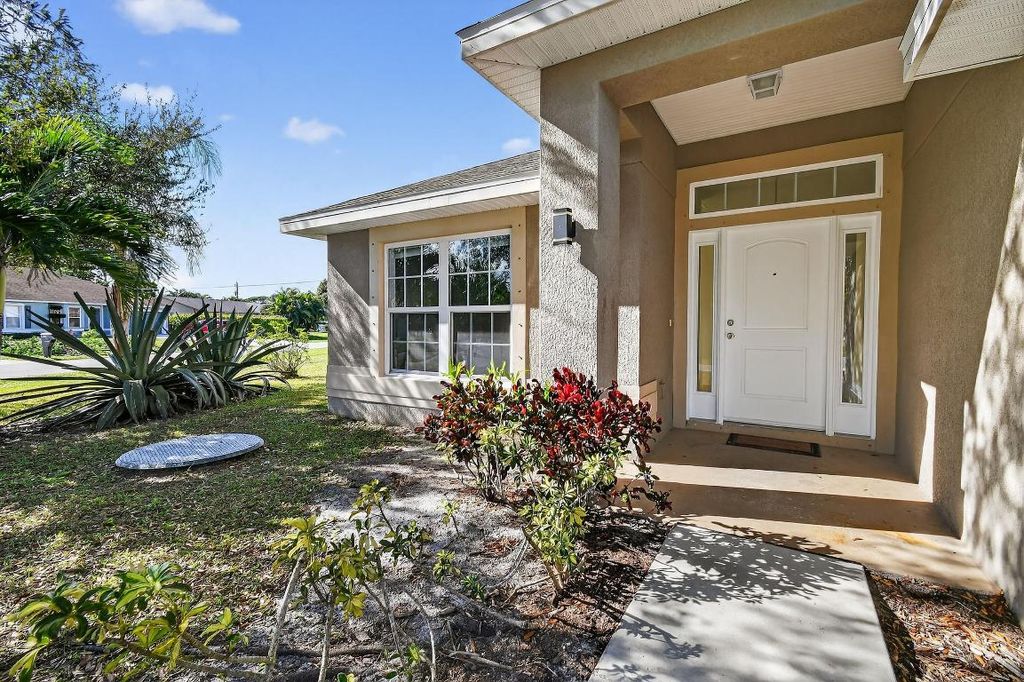 Photo of 1492 SE Morrow Street, Port Saint Lucie, FL 34983 (MLS # R11132225)