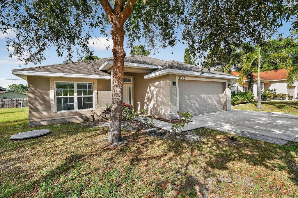 Photo of 1492 SE Morrow Street, Port Saint Lucie, FL 34983 (MLS # R11132225)