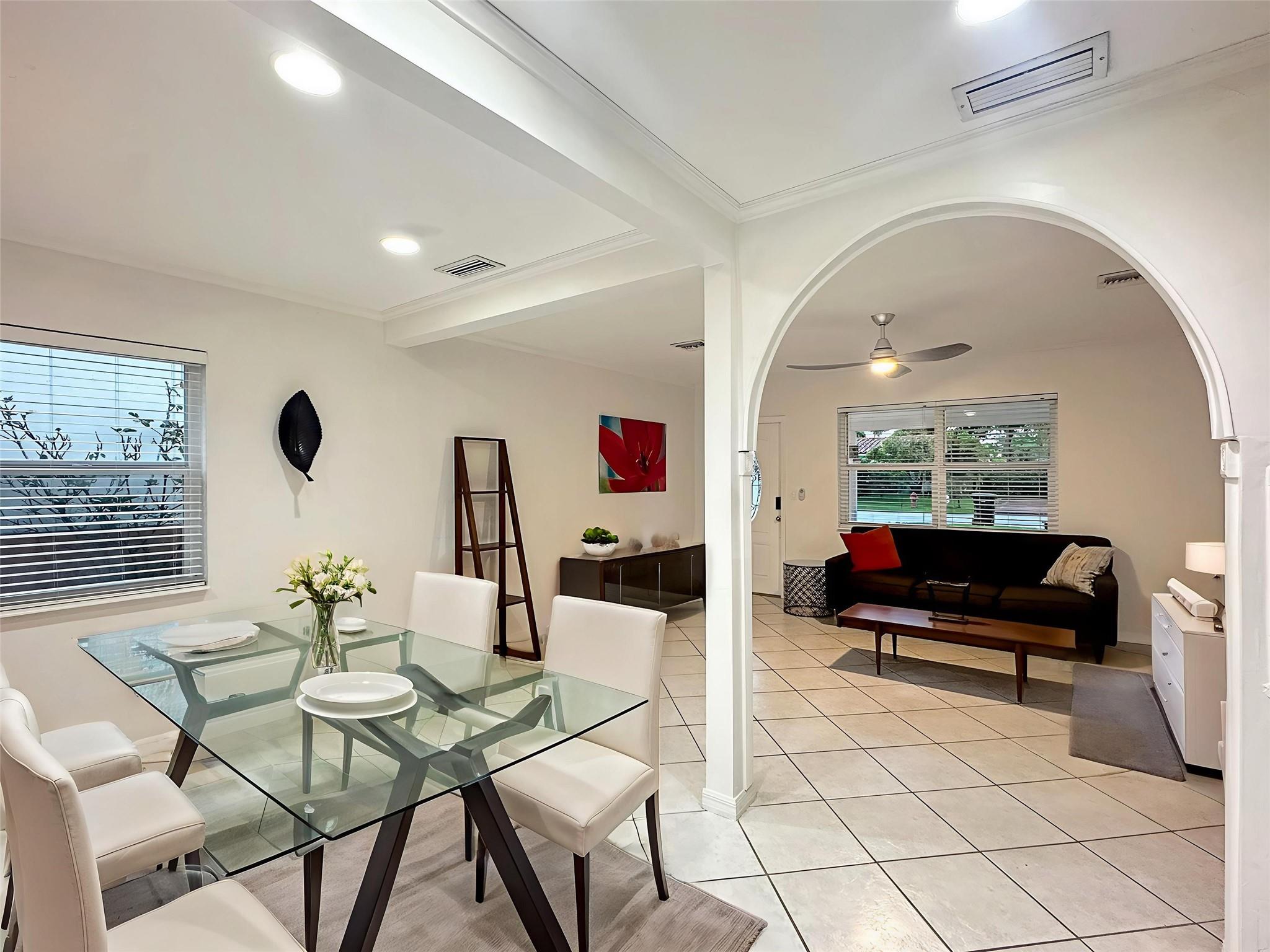 You need to see this 2-Bedroom/1-Bath home just 2 minutes from Wilton Manors & available for immediate lease. Close to the beach, shopping and restaurants in this bright & updated home. Featuring ceramic tile floors, open living and dining areas, and impact windows throughout, this property blends charm with modern touches. The spacious kitchen includes beautiful cabinetry, a breakfast/snack bar, and open to the main living area—perfect for entertaining. Full-size washer & dryer for convenience. new roof. Ceiling fans in the living room & bedroom add extra comfort. Step outside to a lush, large fenced-in backyard with room to relax, entertain, or play with your pets (dog under 30 lbs.). Less than 15 minutes to the airport. Home may be rented partially furnished or empty.