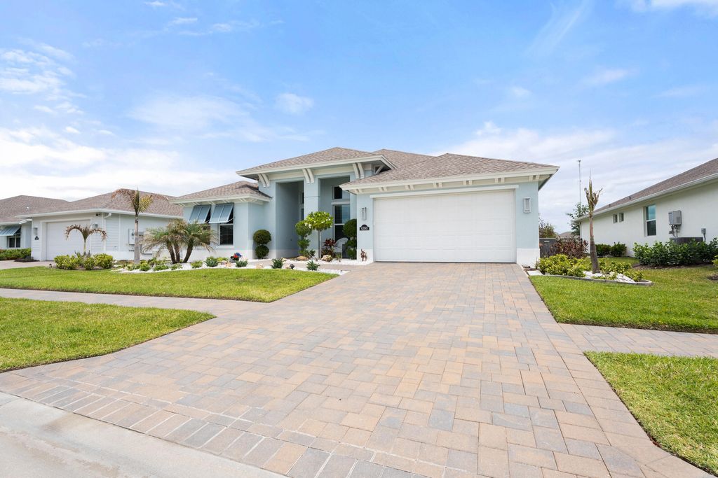 Photo of 6390 High Pointe West Way, Vero Beach, FL 32967 (MLS # B26019931)