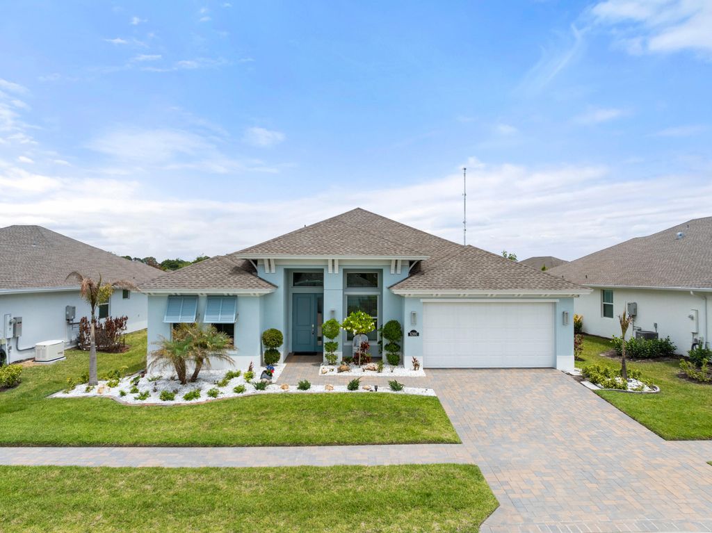 Photo of 6390 High Pointe West Way, Vero Beach, FL 32967 (MLS # B26019931)