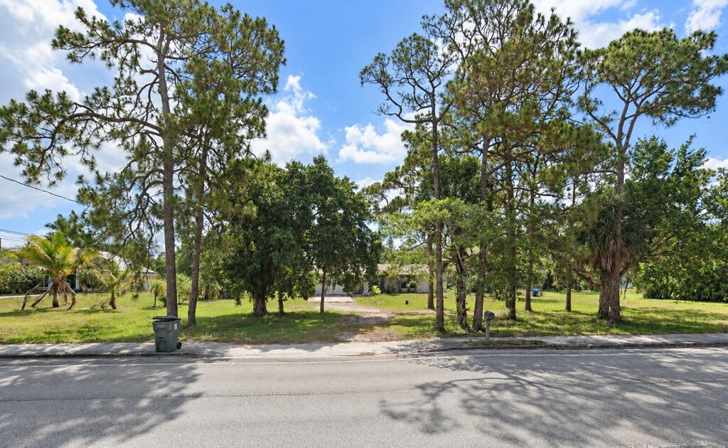 Photo of 4810 ROYAL PALM BEACH Boulevard, The Acreage, FL 33411 (MLS # B26085632)