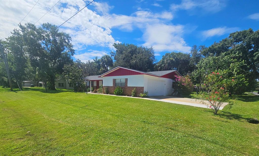 Photo of 1312 Parkland Boulevard, Fort Pierce, FL 34982 (MLS # R11110253)