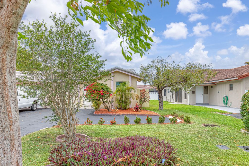Photo of 3912 NW 110th Avenue, Coral Springs, FL 33065 (MLS # B26028178)