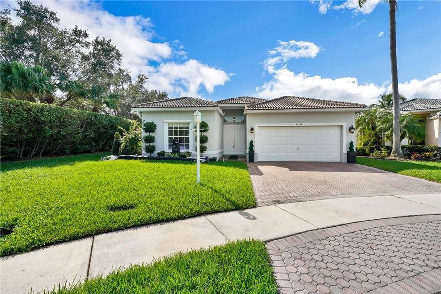 OWNER WILL CREDIT TOWARDS BRAND NEW ROOF AT CLOSING! Beautifully remodeled, freshly landscaped home in highly desirable Wyndham Lakes. Featuring new porcelain tile floors throughout (no carpet), newer AC & W/H, brand new white shaker kitchen cabinets, new high end Stainless Steel appliances, granite countertops, & glass tile backsplash. New Washer & dryer. Open floor plan w/ LED recessed lights, new chandeliers & light fixtures, new blinds & window treatments. Master bedroom features 2 closets (1 XL walk-in). Oversized extended patio w/ recently remodeled pool - new diamondbrite & pool tiles. Freshly painted. Owners did not install baseboards or finish remodeling the master bathroom but it is 80% complete (just needs paint and YOUR finishing touches).